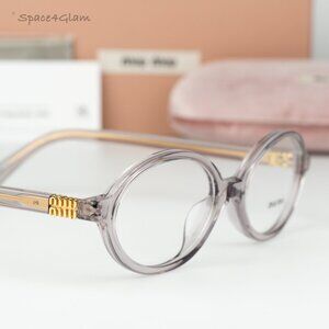 BRAND NEW Miu Miu MU01XV 12W1O1 Mauve Transparent Demo Oval Unisex Eyeglasses
